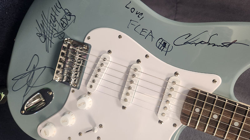 Guitar signed by members of the Red Hot Chili Peppers