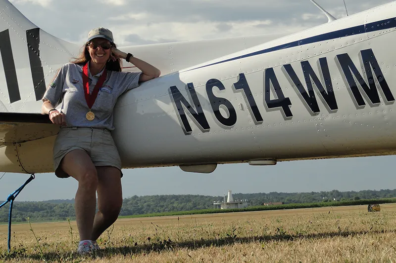 Terry leaning on a small plane 